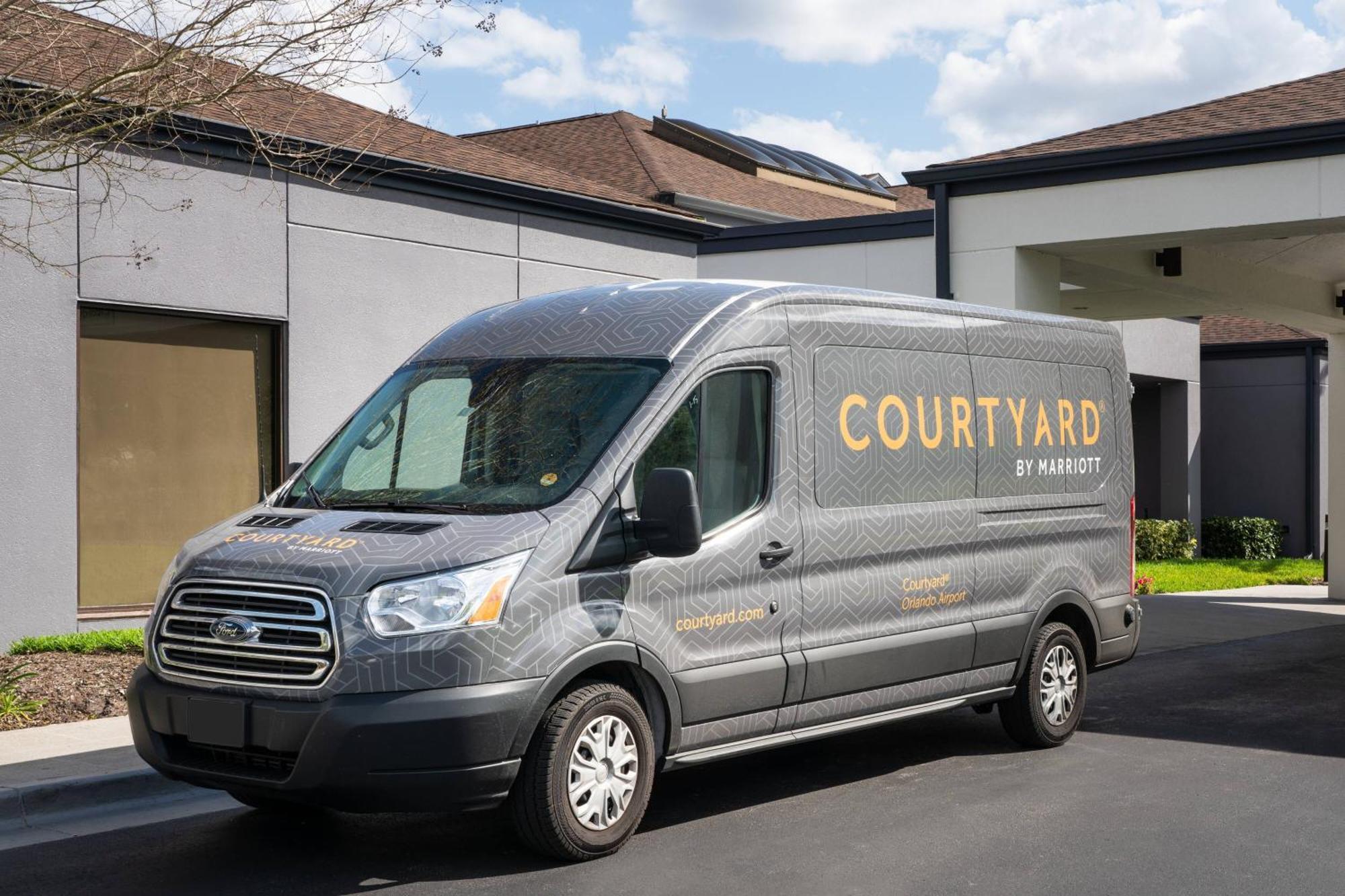 Courtyard By Marriott Orlando Airport Hotel Exterior foto